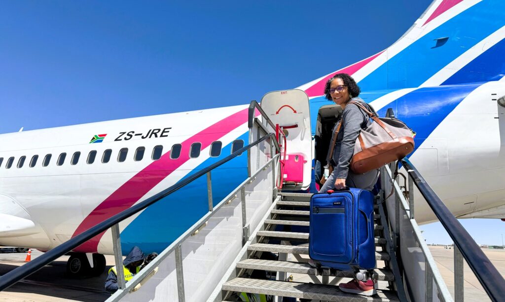 Boarding a domestic flight to attend a knitting retreat in South Africa