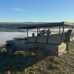 On a safari drive high up on a ridge viewing wildlife.