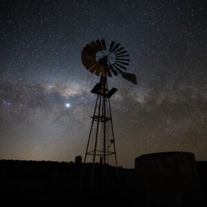 Karoo windmill with dazzling Milky Way in the night sky and no light pollution.